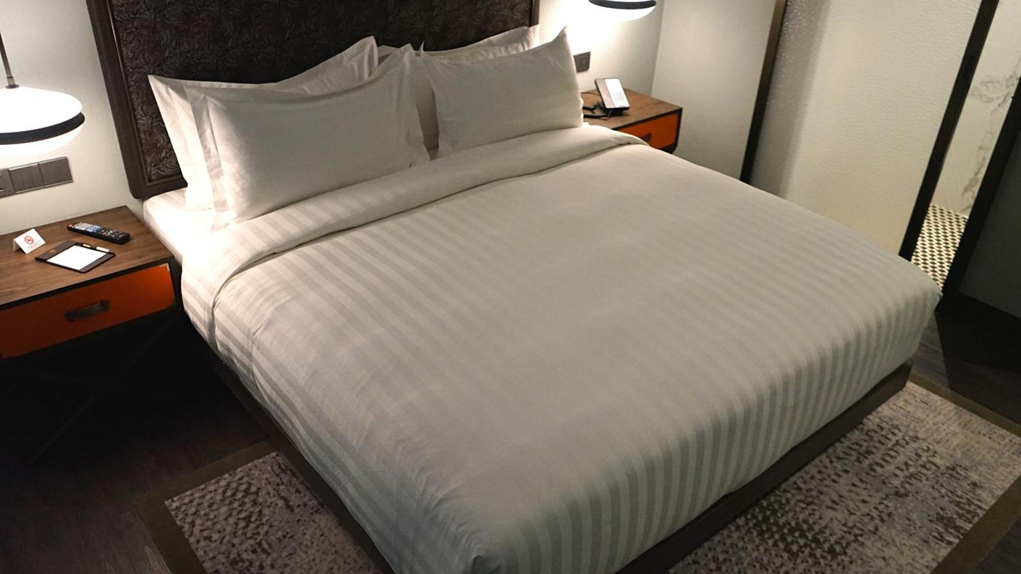 The George Penang By The Crest Collection Hotel George Town Exterior photo A bed with a duvet
